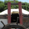 Ship&#039;s wheel and deck structure.